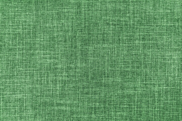 Texture of natural upholstery fabric or cloth. Fabric texture of natural cotton or linen textile material. Green canvas background. Decorative fabric for curtain, furniture, walls, clothes