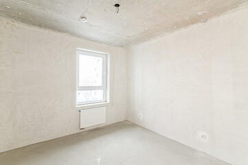 Russia, Moscow- May 21, 2020: interior apartment rough repair for self-finishing. interior decoration, bare walls of the room, stage of construction