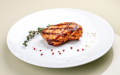 Grilled chicken breast on white background