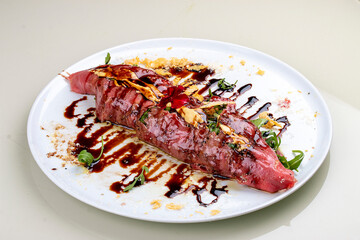 Raw beef tartare with parmesan cheese and wine sauce.