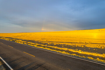 Naklejka premium Rainbow in desert in Xinjiang China
