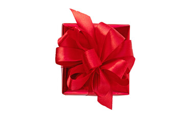 Red gift box with satin ribbon bow top view isolated transparent png. Holidays present.