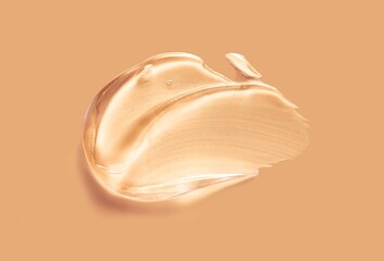 Cosmetic gel isolated on orange beige background smudge 