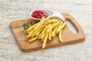French fried potato over board