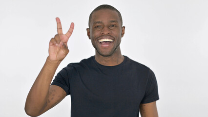 Victory Sign by Young African Man on White Background
