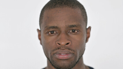 Obraz premium Face Close Up of Serious Young African Man