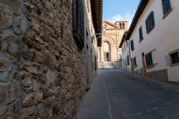 Fototapeta na wymiar A quiet street of residential buildings in the historic medieval village of Panzano Tuscany