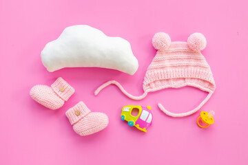 Baby girl pink hat with booties and accessories, top view