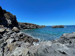 Fototapeta na wymiar volcanic rock formation in the sea on the island of el Hierro