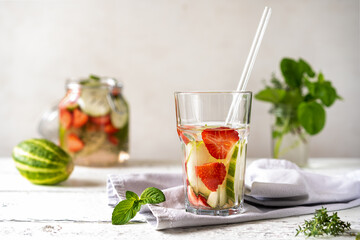 Infused water with strawberry and meloncella that is hybrid of cucumber and melon, thyme, mint. 