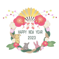 しめ縄の中で遊ぶうさぎ三匹