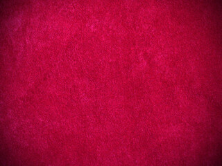 Red velvet fabric texture used as background. Empty red fabric background of soft and smooth textile material. There is space for text.