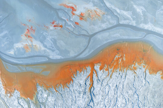 Colorful textures on sandy terrain at mine site in Huelva