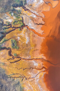 Colorful textures on sandy terrain at mine site in Huelva