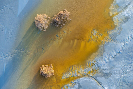 Colorful textures on sandy terrain at mine site in Huelva