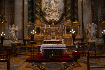 Naklejka premium basilica of the jesuits and tomb of saint ignacius in rome street in ruins of the roman empire in rome, italy with ancient stones and texture