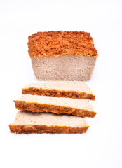 Meat pate, sliced, isolated. Baked meat product on a white background, front view. Packshot photo for package design.