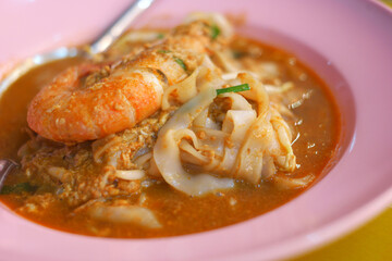 Noodle soup with shrimp on a plate