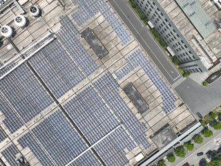 Fototapeta na wymiar solar panels on factory rooftop