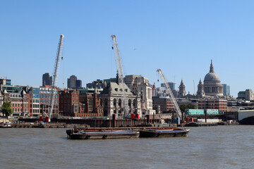 Fototapeta premium View of the City of London across the Thames on a sunny day