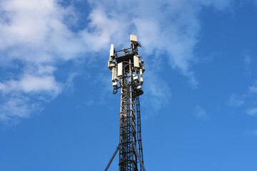 Telecommunications tower of 4G and 5G cellular communication. Transmission by antenna and cellular communication. The base station of the cell phone signal. Telecommunication equipment