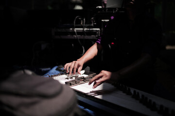 people play musical instruments typical of Indonesia called kecapi