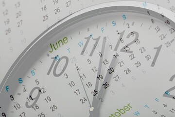 Clock face and calendar composite on background