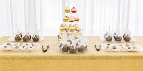 Chocolate covered candied apples, and cupcake pastries displayed for desert at a breakfast brunch celebration.