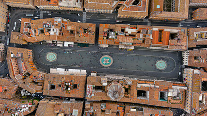 Aerial Stock Footage of a Bird's Eye View Flying Over Piazza Navona and city streets at day in Rome, Italy