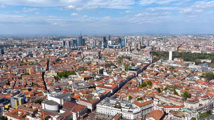 Gordijnen Aerial view of new Milan skyline, Italy. Panorama of Milano city with Porta Nuova futuristic business district. From above drone view of suburb downtown and cityscape with the tall modern buildings 6K © Photo London UK