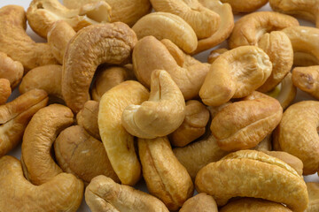 Closeup cashew nuts on natural light.