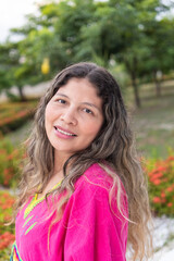young indigenous girl wearing a colorful dress