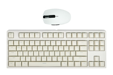 Light computer keyboard and mouse isolated on white background close-up, top view