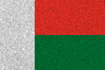 Flag of Madagascar on styrofoam texture. national flag painted on the surface of plastic foam