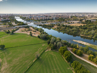 Aerial view of Ebro River,Railroad Bridge and Pilar Basilica