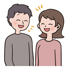 向かい合って笑う男女