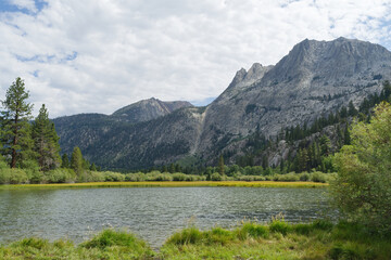 Silver Lake in Inyo National Forest, California, shown against a cloudy sky.