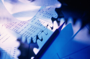 Bill with a pencil and numbers superimposed over it