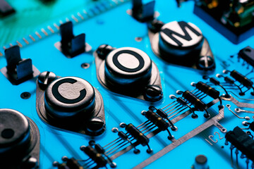 .Com printed on components of a circuit board