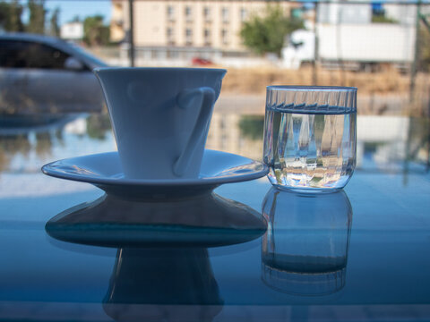 Glass Of Waterand Turkish Coffee On The Table