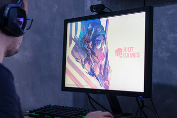Santos, Brazil - September 7, 2022: Gamer man playing Valorant video game on PC. Valorant is an online shooter game (FPS) developed by Riot Games.  © kyllian