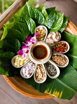 Thai Food Platter. Koh Samui, Thailand. A Thai platter with betel leaves, pineapple, red onion, peanuts, seasame seeds, toasted coconut.