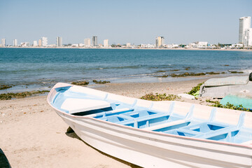 Fototapeta premium boats on the beach in Mazatlan Mexico