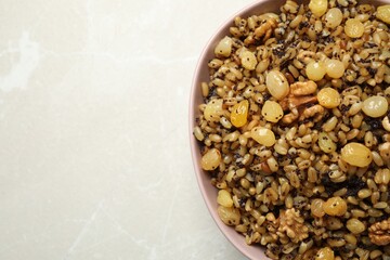 Traditional Christmas slavic dish kutia on grey table, top view. Space for text