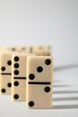 Domino tiles on white background. Space for text