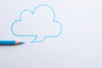 Drawing of cloud and light blue pencil on white background, top view