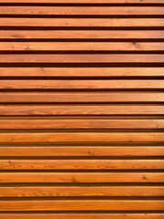 Facade of horizontal brown wooden slats