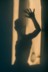 silhouette of a person in a dark