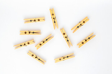 clothespins wooden close-up on a white background