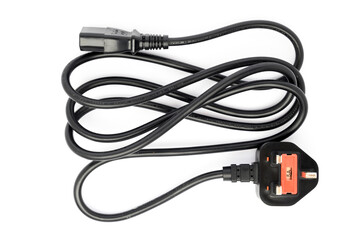 computer power cord with G-type plug with internal fuse close-up on white background